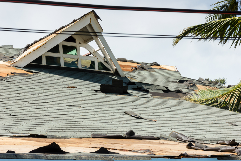 A,Large,Building,With,A,Damaged,Roof,Following,A,Massive